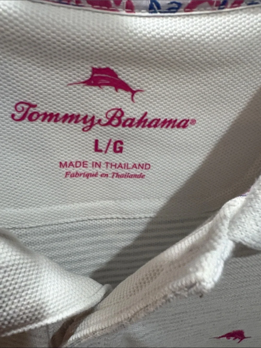 Tommy Bahama White Polo with Pink Dolphin Logo